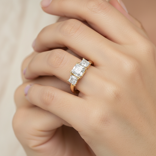 Yellow Gold Three Stone Emerald cut Diamond Engagement Ring with Pave Band