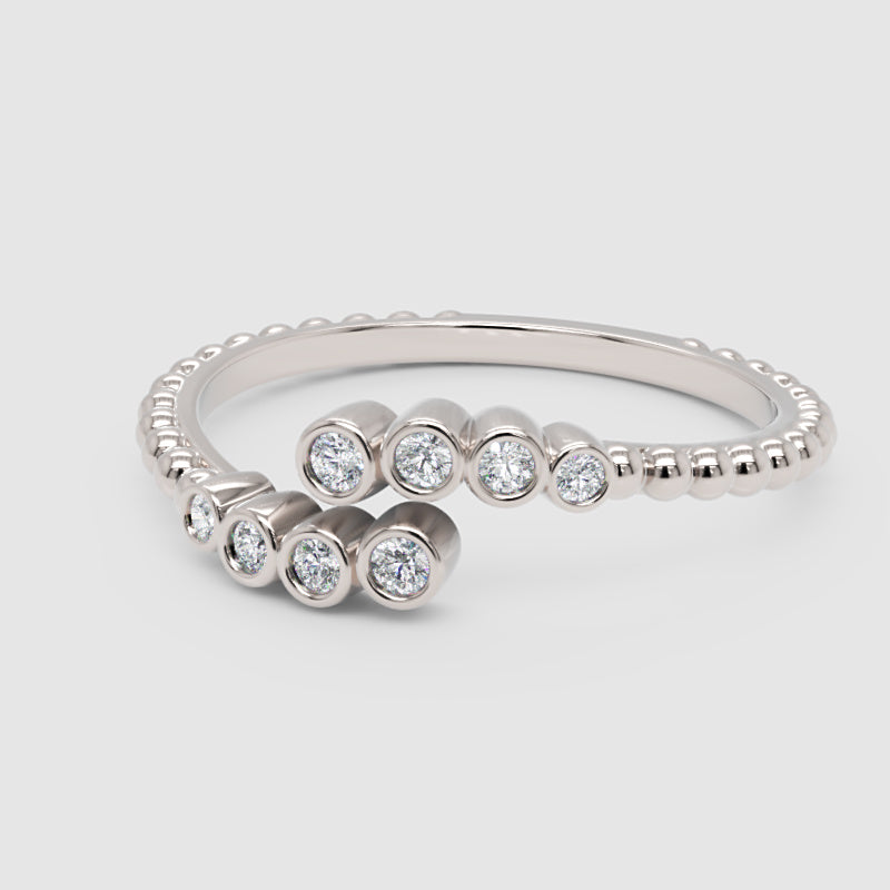 Bezel Set Diamond Bypass Ring With Beaded Band - One