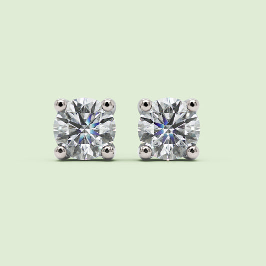 Round Diamond Solitaire Stud Earrings in White Gold Four Prong Setting