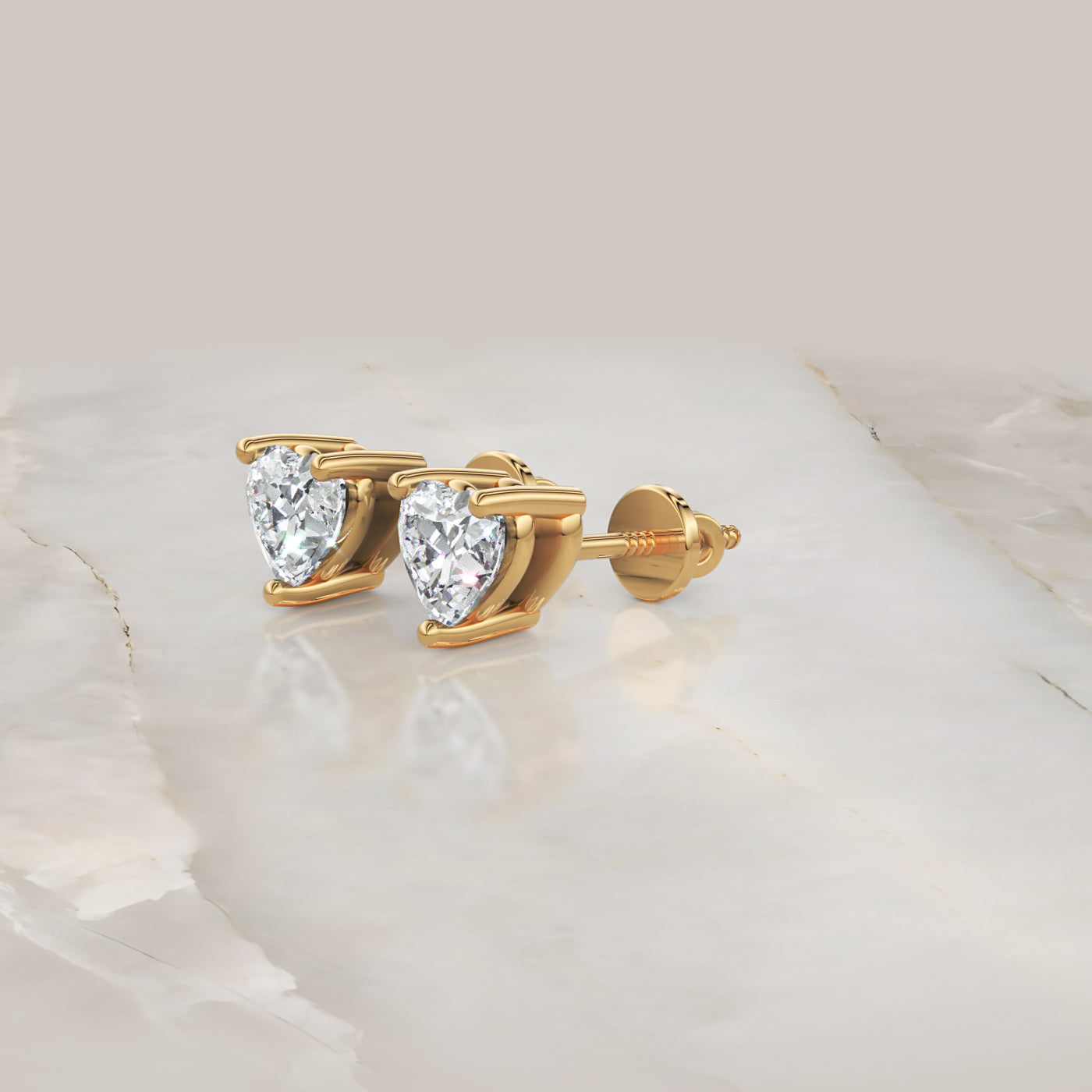 Heart Shape Diamond Stud Earrings In Gold - Four