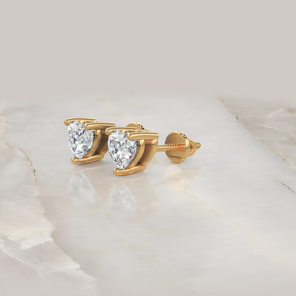 Heart Shape Diamond Stud Earrings In Gold - Four