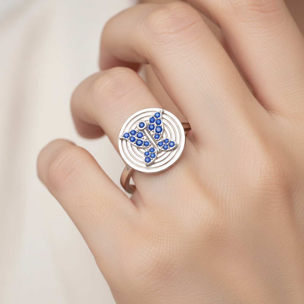 Blue Sapphire Butterfly Concentric Circle Ring - Eight
