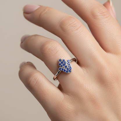 Blue Sapphire Hamsa Hand Disc Ring With Sunburst Design - Nine