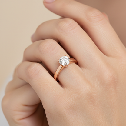Rose Gold Solitaire Diamond Engagement Ring With Round Cut Stone - Two
