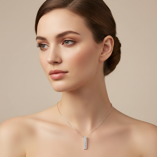 Baguette and Round Diamond Vertical Bar Pendant Necklace in White Gold