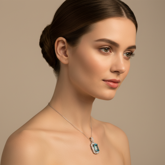 Emerald Cut Blue Topaz Halo Pendant Necklace in Sterling Silver